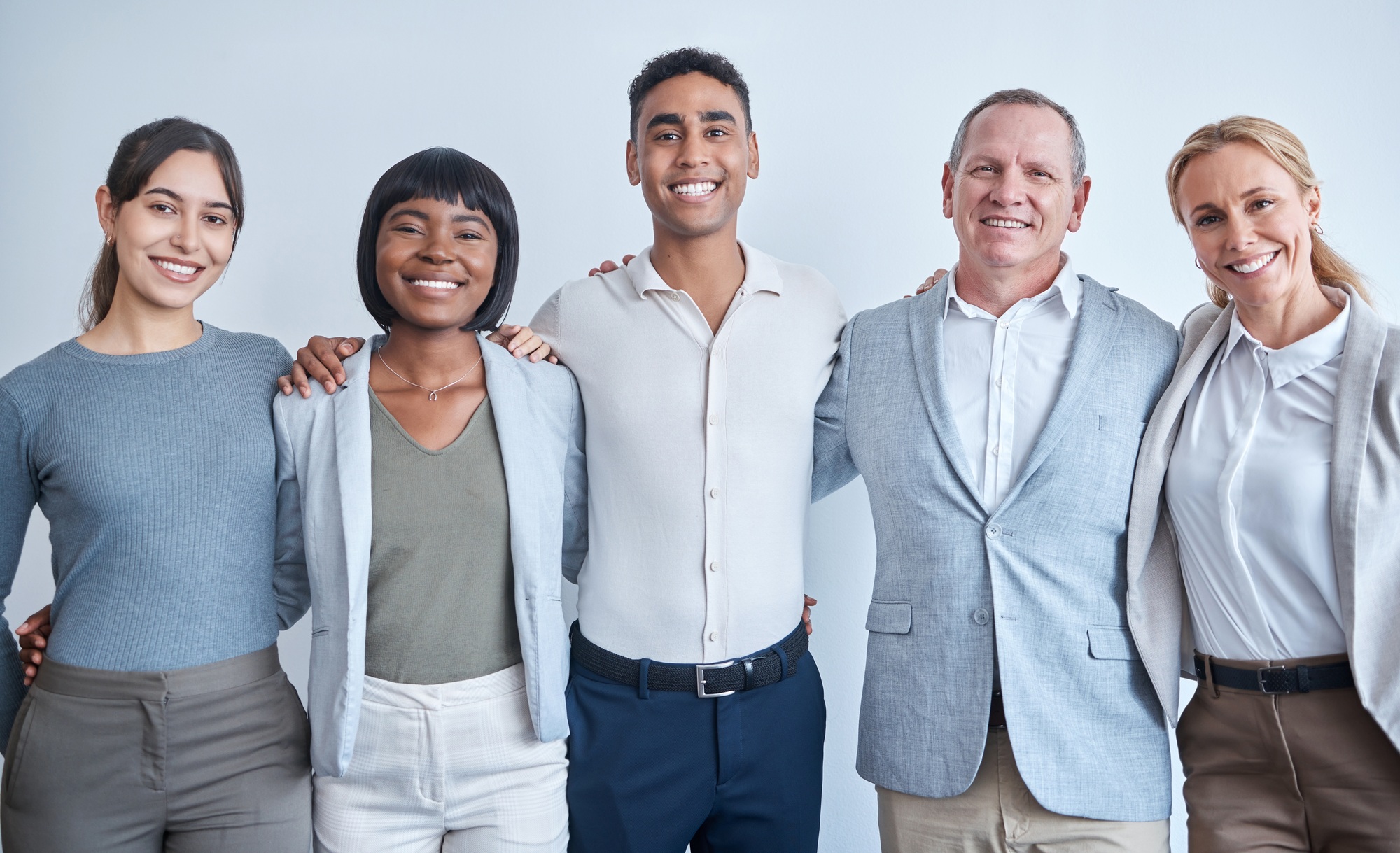 Part team, part family. Portrait of a group of businesspeople working in a modern office.